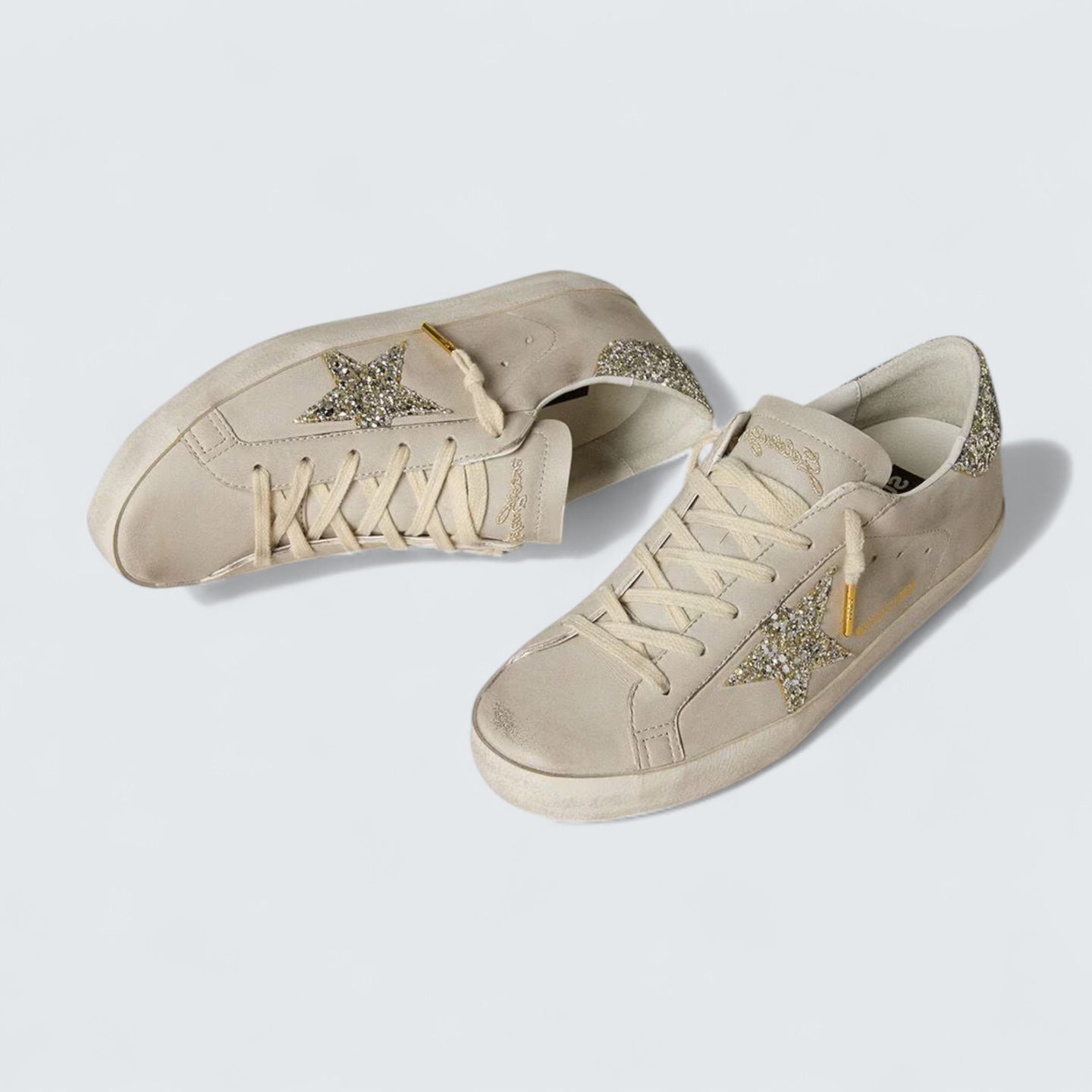Super-Star LTD 'Ivory Nappa Leather with Platinum Glitter Star and Heel Tab'