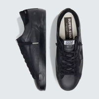 Super-Star in black nappa with black suede star and black heel tab