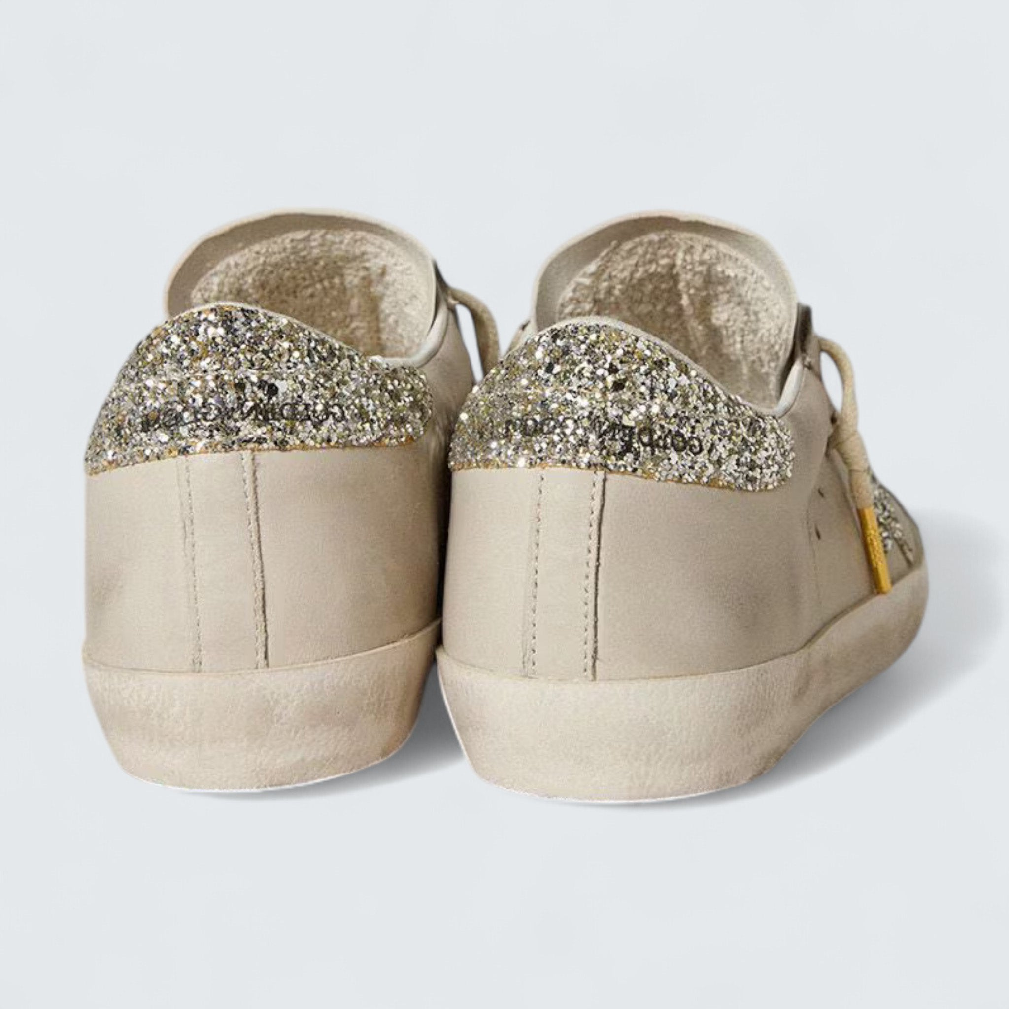 Super-Star LTD 'Ivory Nappa Leather with Platinum Glitter Star and Heel Tab'